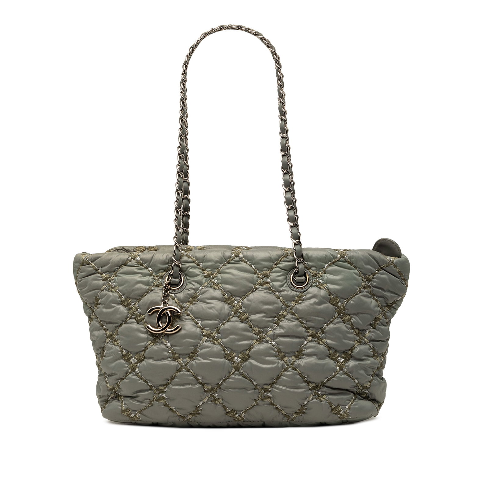 Chanel Paris Byzance quilted nylon tote with tweed trim: Chanel Paris Byzance quilted nylon tote with tweed trim Chanel Paris Byzance tote bag crafted with a quilted nylon body and tweed trim. It features leather woven-chain link straps, a top zip closure, 