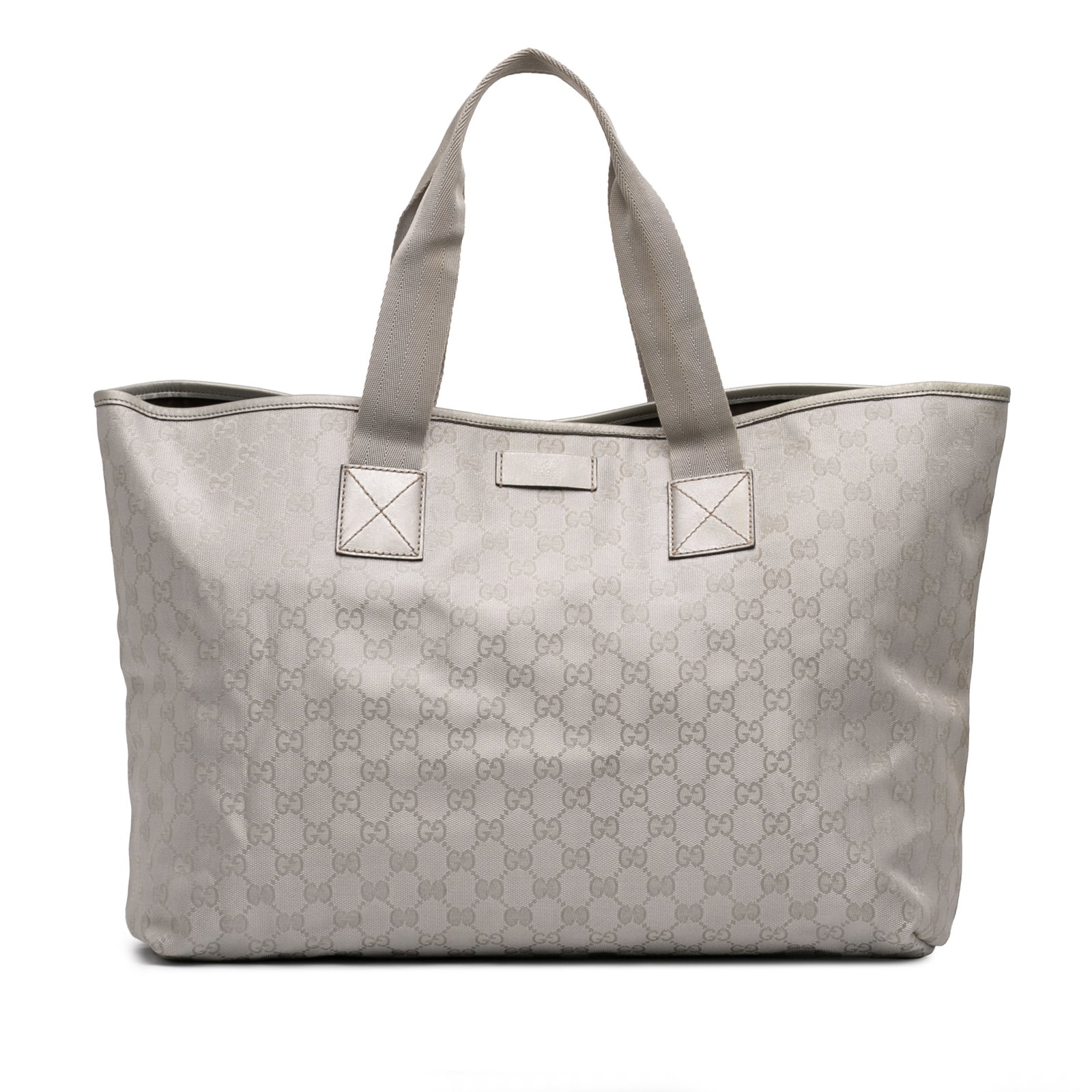 GG Canvas Tote Bag with Leather Trim by Gucci: GG Canvas Tote Bag with Leather Trim by Gucci This Gucci GG Canvas Tote features a canvas exterior with leather trim, flat handles, an open top with a magnetic snap closure, and interior zip and slip 