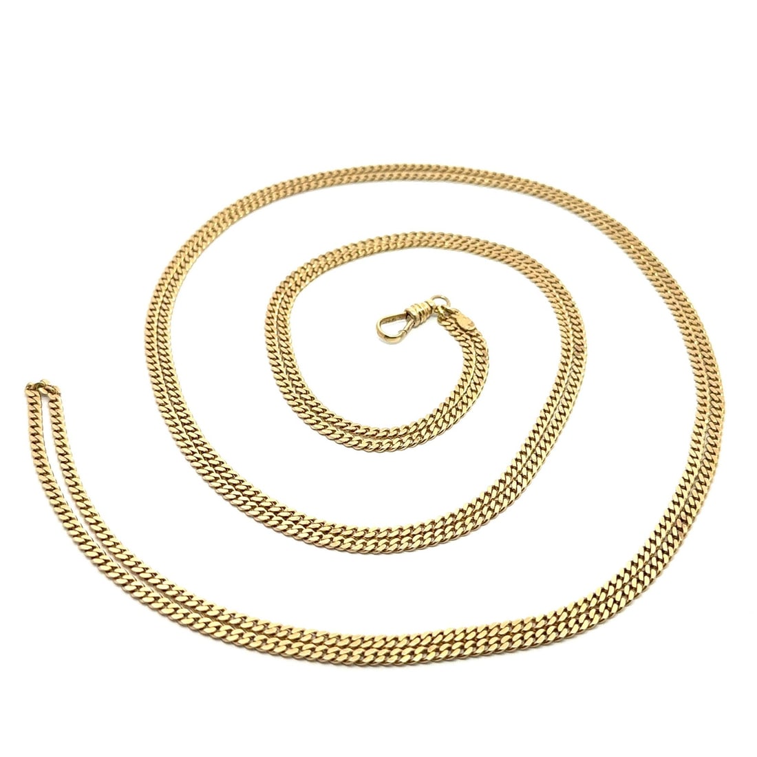 64 Inch 14k Yellow Gold Flat Curb Link Chain With Dog Clip Clasp: 64 Inch 14k Yellow Gold Flat Curb Link Chain With Dog Clip Clasp This vintage necklace features a long 64-inch flat curb link watch chain crafted from solid 14k yellow gold, complemented by a 12-14k y