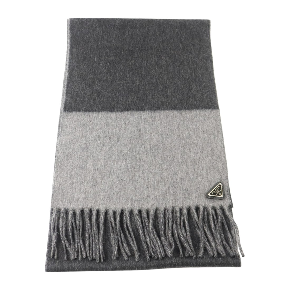 PRADA 2FS117 Mens Cashmere Scarf Black Gray 180x28: PRADA 2FS117 Mens Cashmere Scarf Black Gray 180x28 A PRADA mens scarf in cashmere, presented in black and gray. The piece measures 180 cm x 28 cm and is identified by model number 2FS117. It is made i