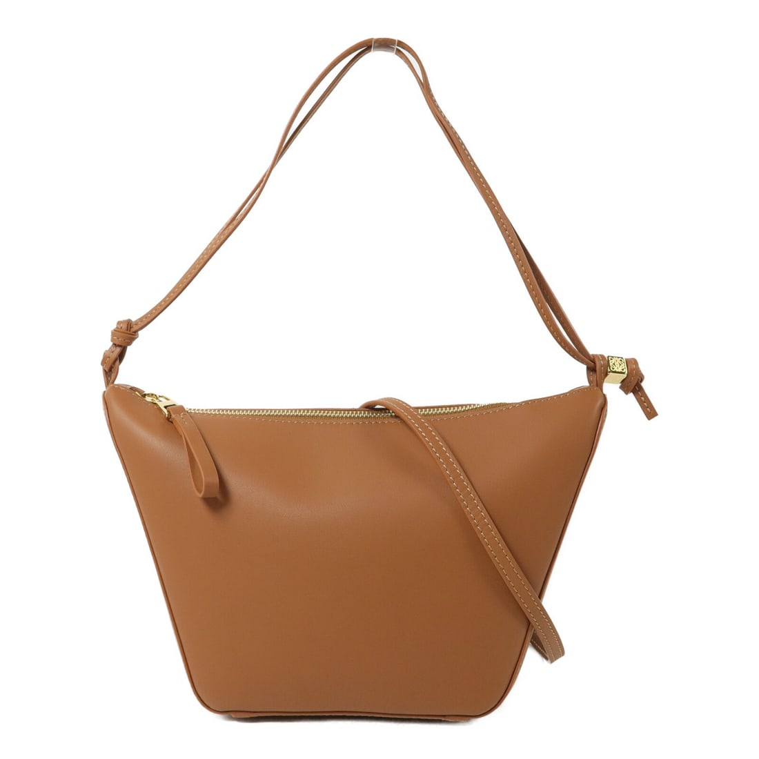 LOEWE Mini Hammock 2 Way Hobo Bag Calfskin Brown: LOEWE Mini Hammock 2 Way Hobo Bag Calfskin Brown Mini Hammock Hobo 2 Way Shoulder Bag in calfskin leather with a brown and tan colorway. It features a shoulder strap and storage bag accessory, and is 