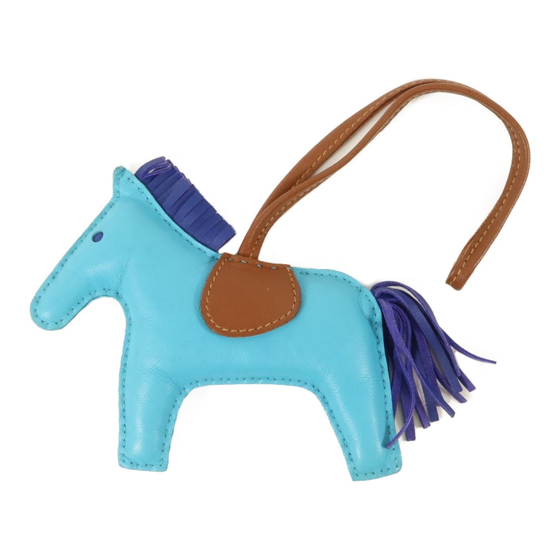 Hermes Rodeo MM Milo Lambskin Bag Charm Bleu Electrique Fauve: Hermes Rodeo MM Milo Lambskin Bag Charm Bleu Electrique Fauve Hermes Rodeo MM charm made from Milo lambskin (sheep leather) in Bleu Azteque, Bleu Electrique, and Fauve. The item is in very good AB con