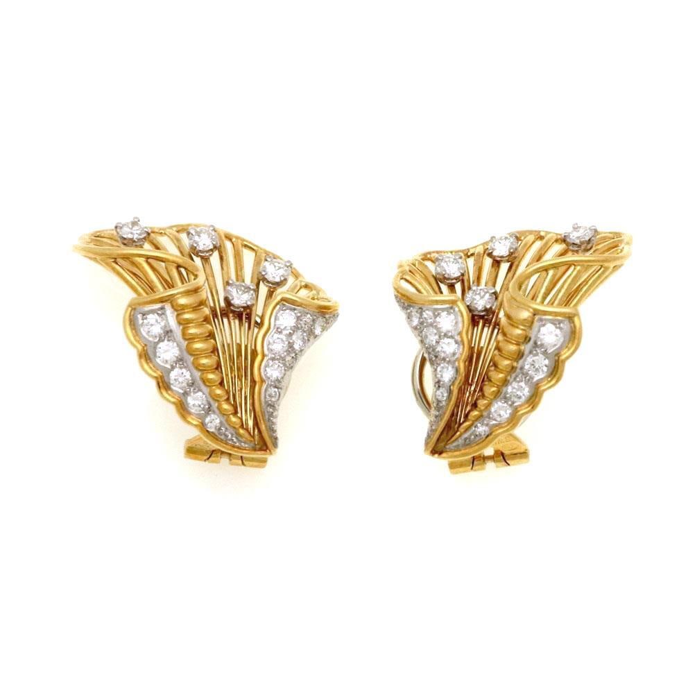 Cartier 1940s Floral Clip-On Earrings 18k Gold Platinum with Diamonds: Cartier 1940s Floral Clip-On Earrings 18k Gold Platinum with Diamonds Discover the elegance of these rare authentic clip-on earrings from Cartier, featuring a stunning floral design. Crafted from 18k 