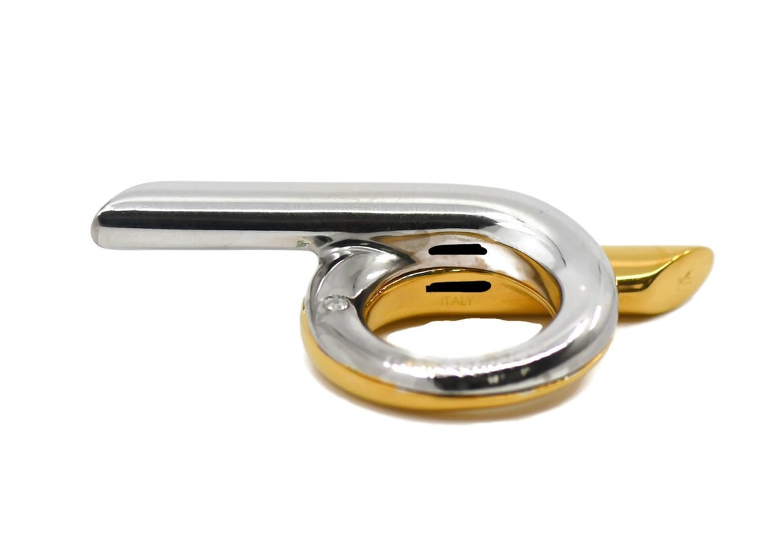 Size 7 Louis Vuitton Italian Stainless Steel Authentic Ring: Size 7 Louis Vuitton Italian Stainless Steel Authentic Ring This Louis Vuitton ring is crafted from stainless steel and features a size 7 fit. Made in Italy, it is a pre-owned piece with a weight of 3