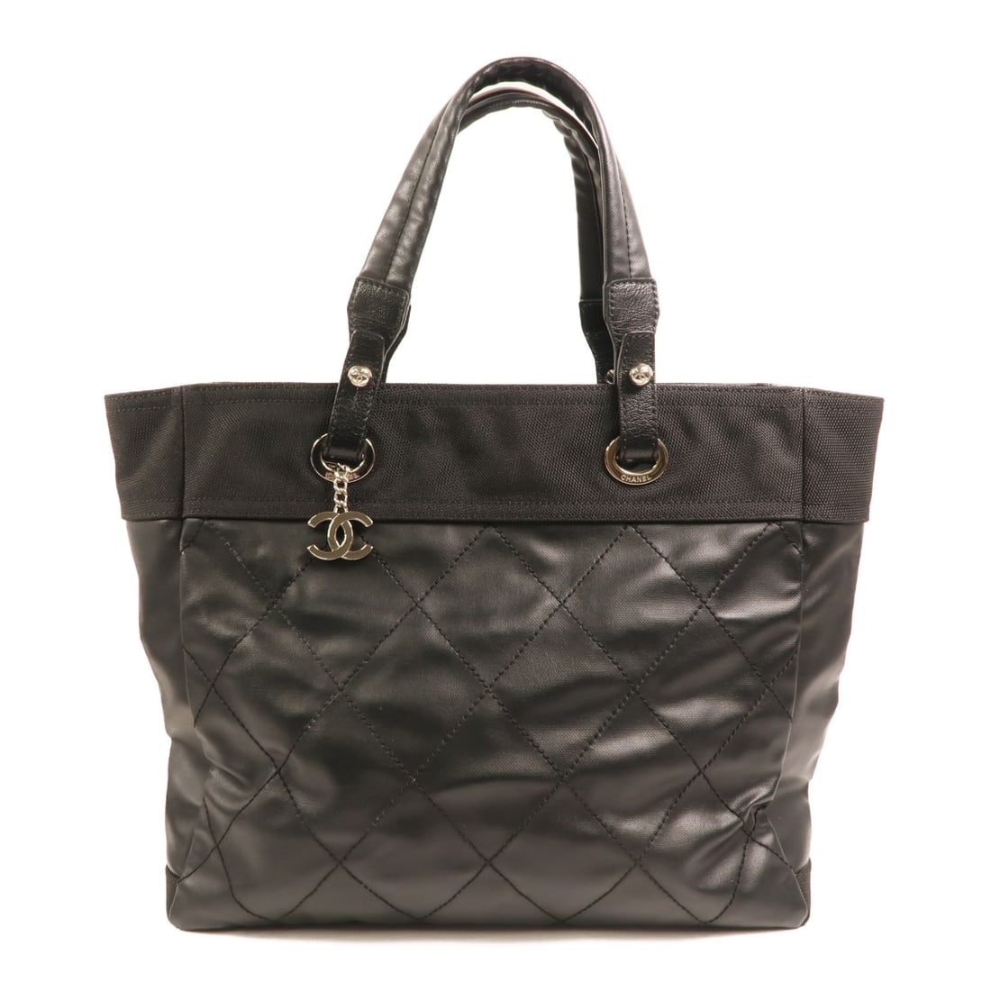 CHANEL Biarritz MM CC Tote Bag Black PVC Coated Canvas: CHANEL Biarritz MM CC Tote Bag Black PVC Coated Canvas A CHANEL Biarritz MM tote bag in black PVC coated canvas with a black frame color. It is a unisex regular-size tote bag made in France and comes 