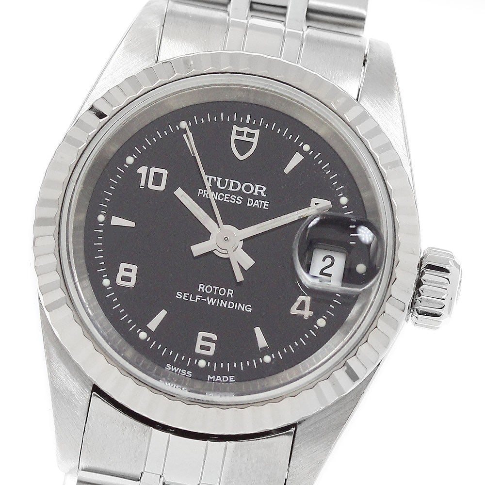 Tudor Princess Date 92414 Womens Automatic Wristwatch White Gold Bezel: Tudor Princess Date 92414 Womens Automatic Wristwatch White Gold Bezel Tudor Princess Date women's wristwatch, model 92414, with an automatic movement and date function. It features a stainless steel 