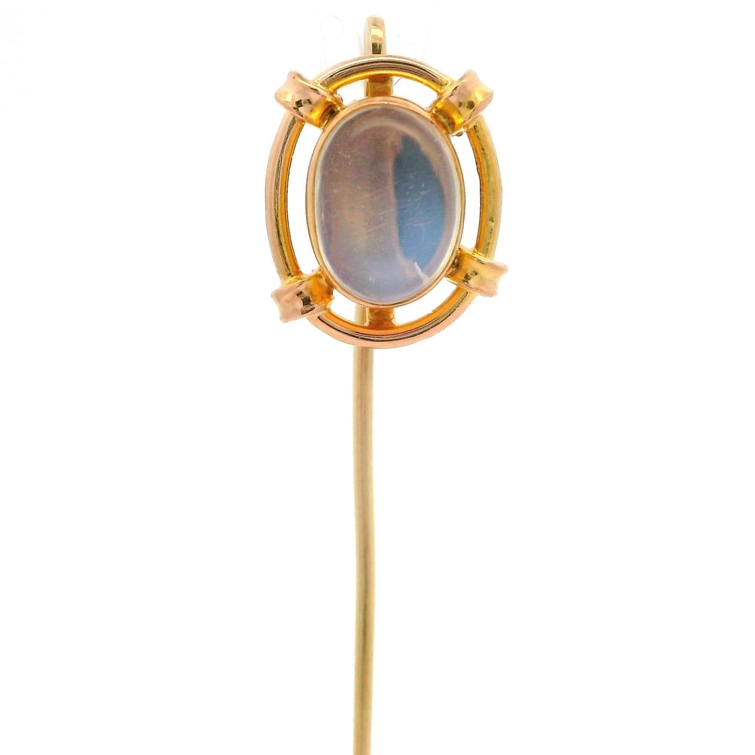 Antique Art Nouveau 14k Yellow Gold Moonstone Open Work Stick Pin: Antique Art Nouveau 14k Yellow Gold Moonstone Open Work Stick Pin This exquisite Antique Art Nouveau stick pin showcases a stunning natural moonstone, expertly crafted in 14k yellow gold. The moonston