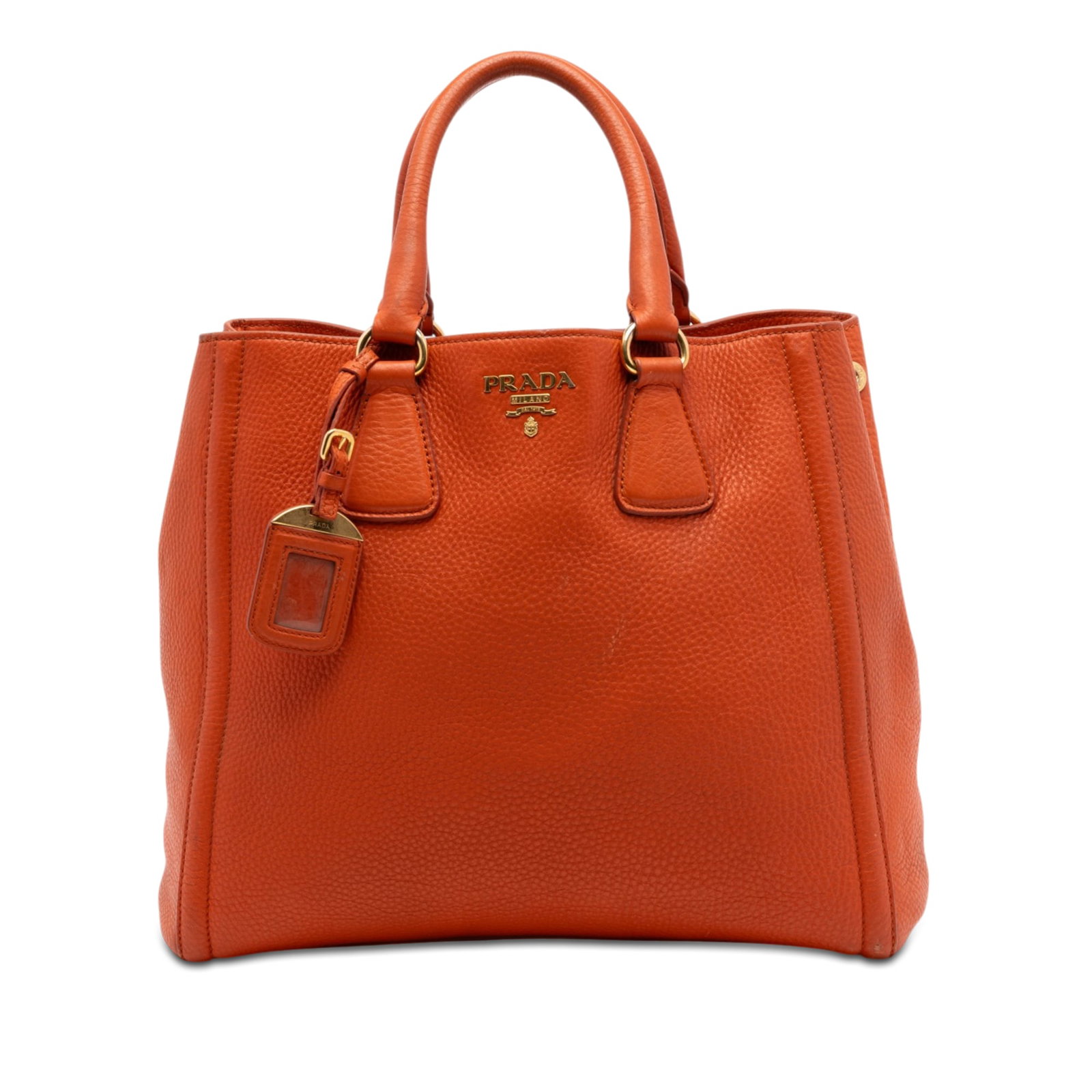 Prada Orange Leather Convertible Satchel Tote: Prada Orange Leather Convertible Satchel Tote This Prada Vitello Daino Open Convertible Tote is crafted from orange leather and features rolled leather handles, an open top with snap button closure, a