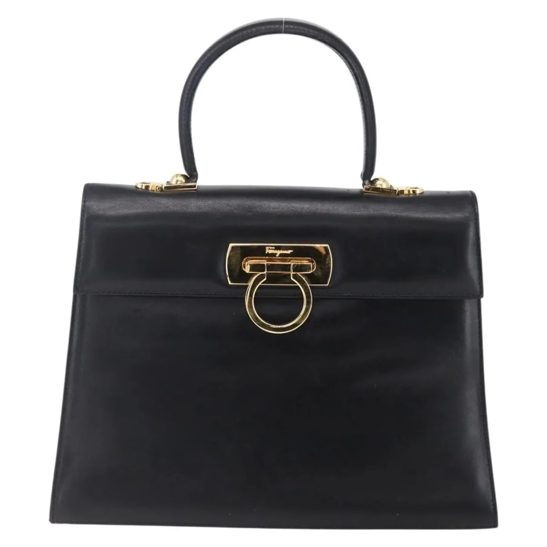 Black Leather Handbag Salvatore Ferragamo Gancini Italy: Black Leather Handbag Salvatore Ferragamo Gancini Italy This pre-owned Salvatore Ferragamo Gancini handbag features a classic black leather exterior with metal fittings. Designed for women, the handba