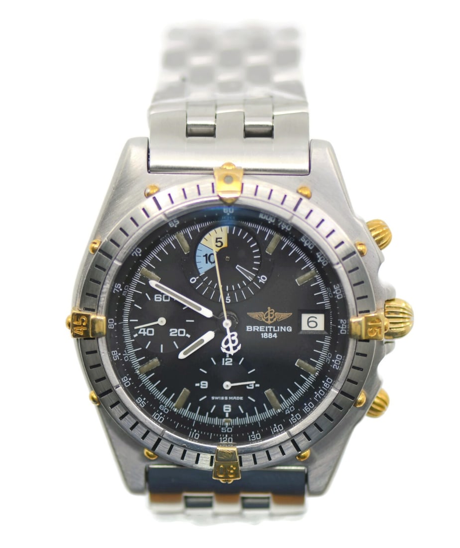 Breitling Chronomat B13047 Two Tone Stainless Steel Automatic Watch: Breitling Chronomat B13047 Two Tone Stainless Steel Automatic Watch Discover the elegance of the Breitling Chronomat Two Tone Stainless Steel Watch, model B13047. This exquisite wristwatch features a 