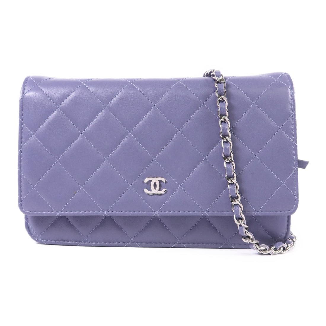 CHANEL WOC Wallet on Chain Shoulder Bag Purple Lambskin SHW CC: CHANEL WOC Wallet on Chain Shoulder Bag Purple Lambskin SHW CC CHANEL Wallet On Chain shoulder bag in purple lambskin leather. This WOC features a hook button closure, multiple interior open pockets, 