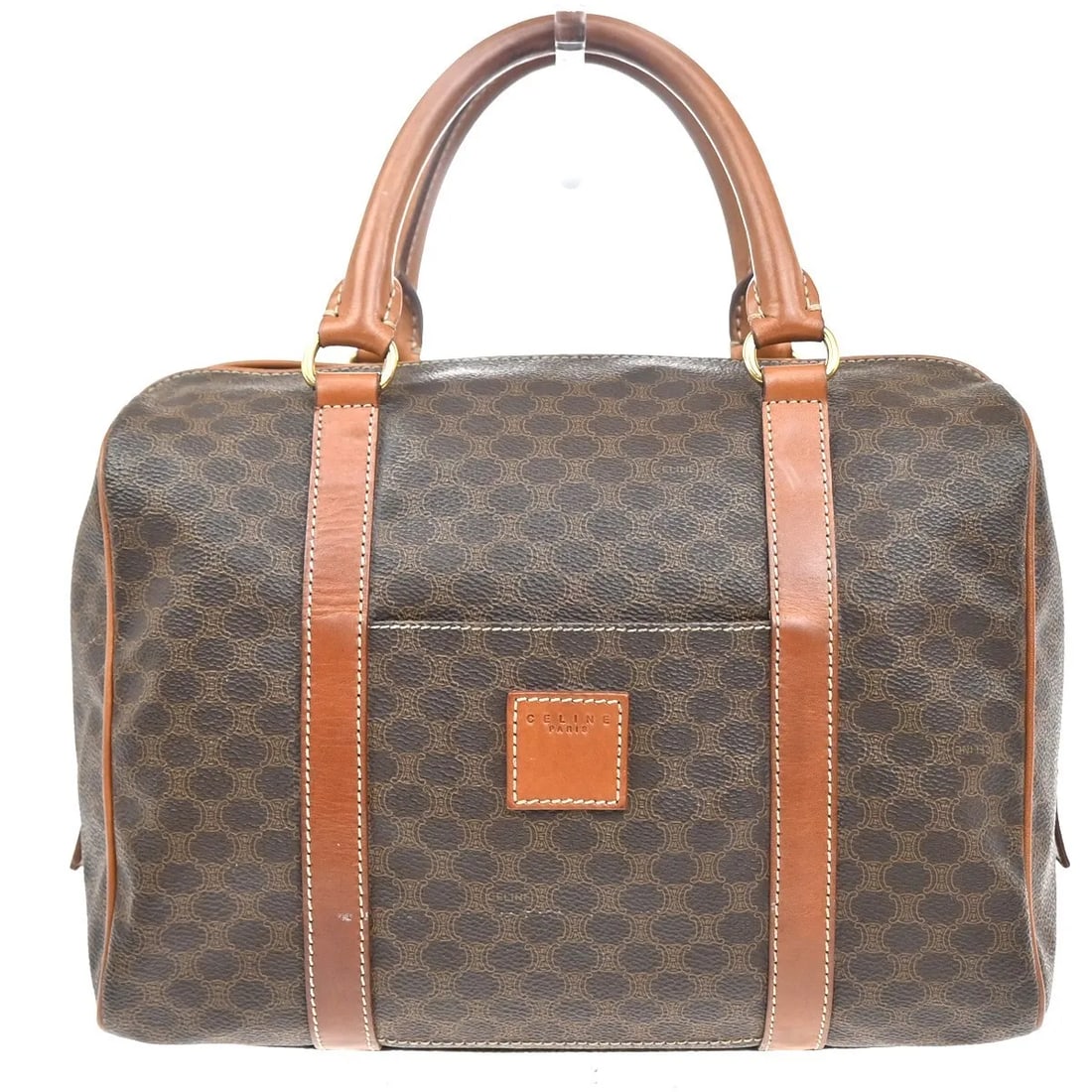 Celine Macadam Brown PVC Handbag with Leather Trim: Celine Macadam Brown PVC Handbag with Leather Trim This Celine Macadam handbag for women features a brown PVC exterior with leather accents. It measures 28cm x 23cm x 14cm and was made in Italy. The h