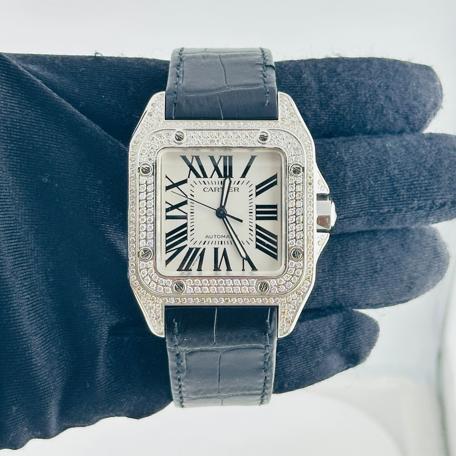 Cartier Santos Ref 2656 Mens Watch Diamond Bezel Aftermarket Leather Band: Cartier Santos Ref 2656 Mens Watch Diamond Bezel Aftermarket Leather Band This Cartier Santos men's watch features a silver Roman numeral dial and a diamond bezel. It is paired with an aftermarket lea