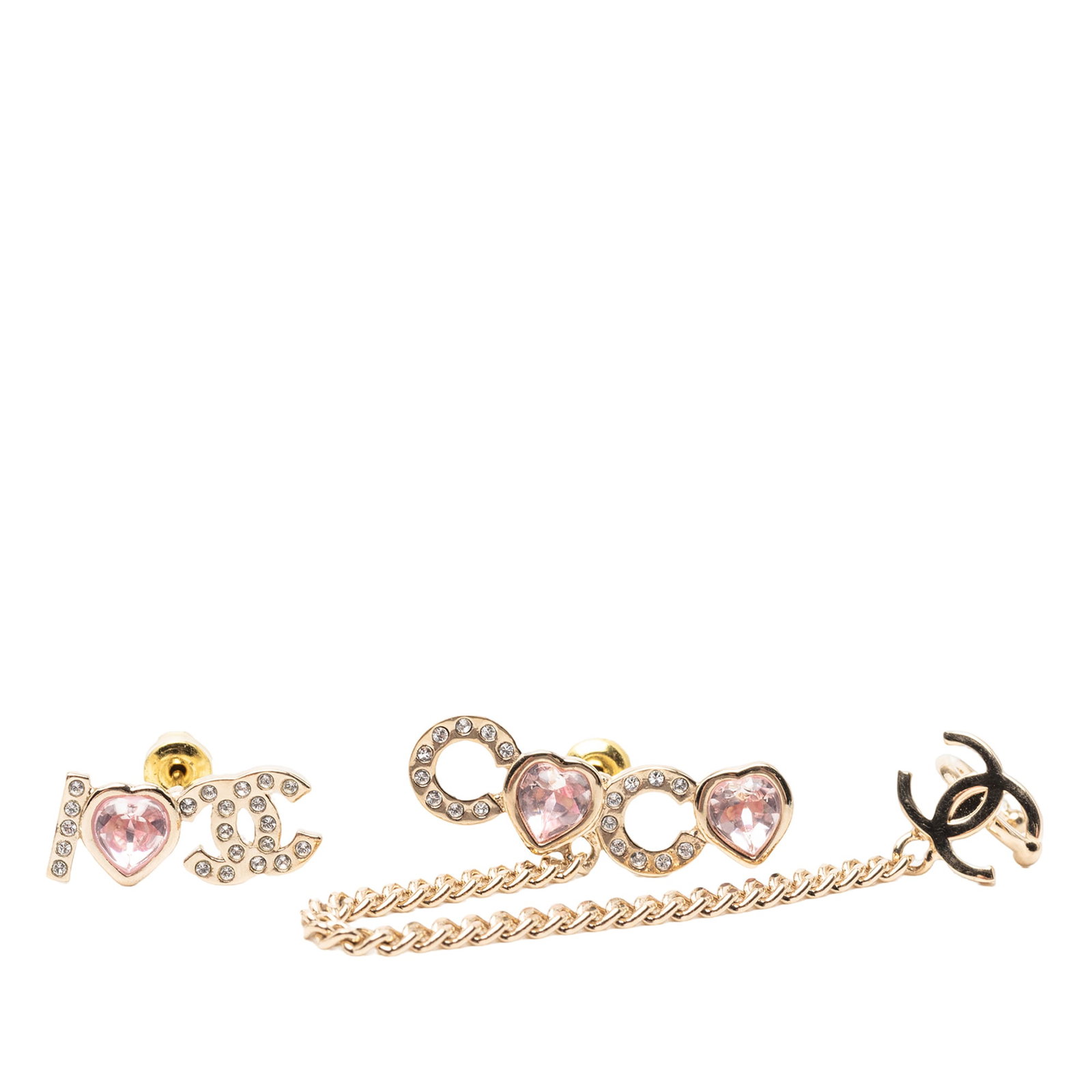 Chanel gold plated strass ear cuff chain earrings: Chanel gold plated strass ear cuff chain earrings These Chanel earrings feature a gold plated metal body adorned with strass embellishments. The design includes an ear cuff chain and bullet back closu