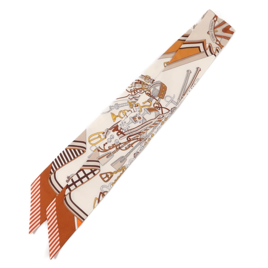 Hermes Twilly Silk Scarf Multicolor Orange White with Box: Hermes Twilly Silk Scarf Multicolor Orange White with Box Hermes Twilly scarf in multicolor with orange and white accents, made from silk. It measures 85 cm x 5 cm (33.5 in x 2.0 in) and comes with a 