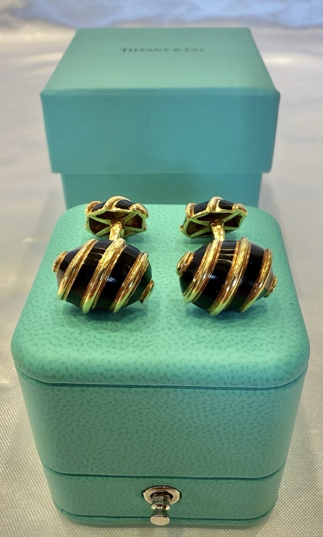 Schlumberger for Tiffany & Co 18K Gold Enameled Cufflinks with Box: Schlumberger for Tiffany & Co 18K Gold Enameled Cufflinks with Box This exquisite pair of cufflinks, crafted by Schlumberger for Tiffany & Co, features elegant enameled designs in 18k yellow gold. Eac