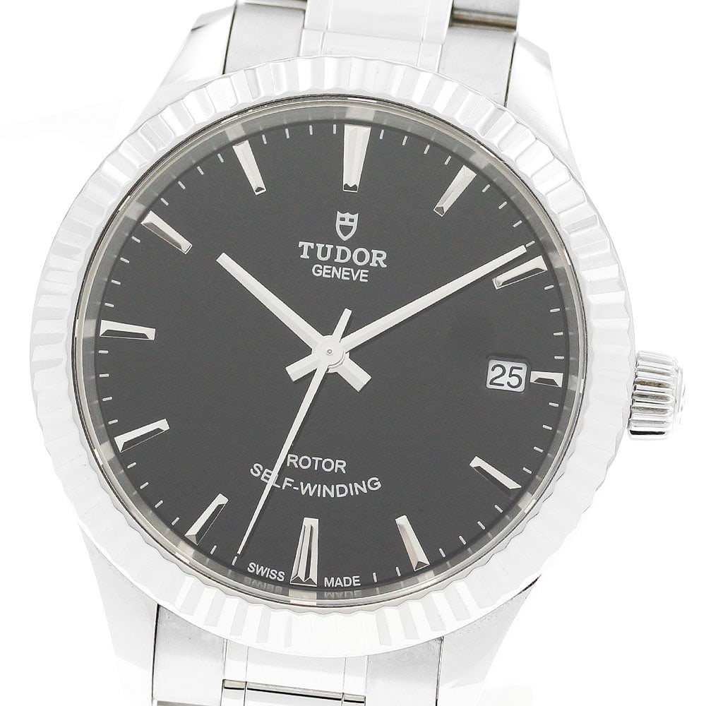 TUDOR Style 12310 Automatic Date Unisex Wristwatch: TUDOR Style 12310 Automatic Date Unisex Wristwatch TUDOR Style Date automatic wristwatch, model 12310, with a stainless steel case and bracelet. It features a black dial, date function, and Swiss orig