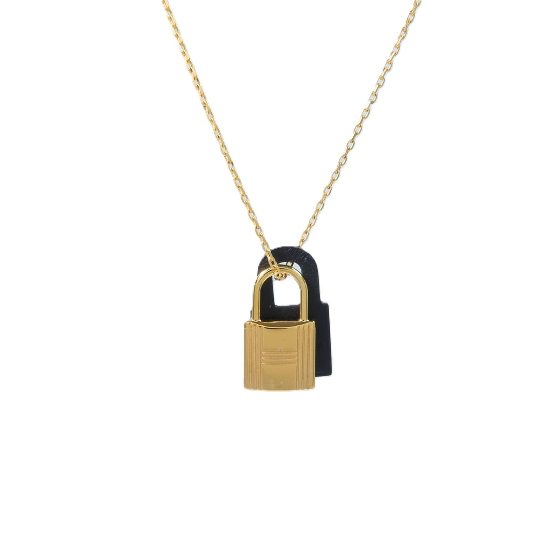 Hermes O'Kelly leather and metal necklace in black and gold: Hermes O'Kelly leather and metal necklace in black and gold Hermes O'Kelly Necklace in black and gold tones, made with Veau Swift leather, calfskin (cowhide), and metal. It features a neck rotation of
