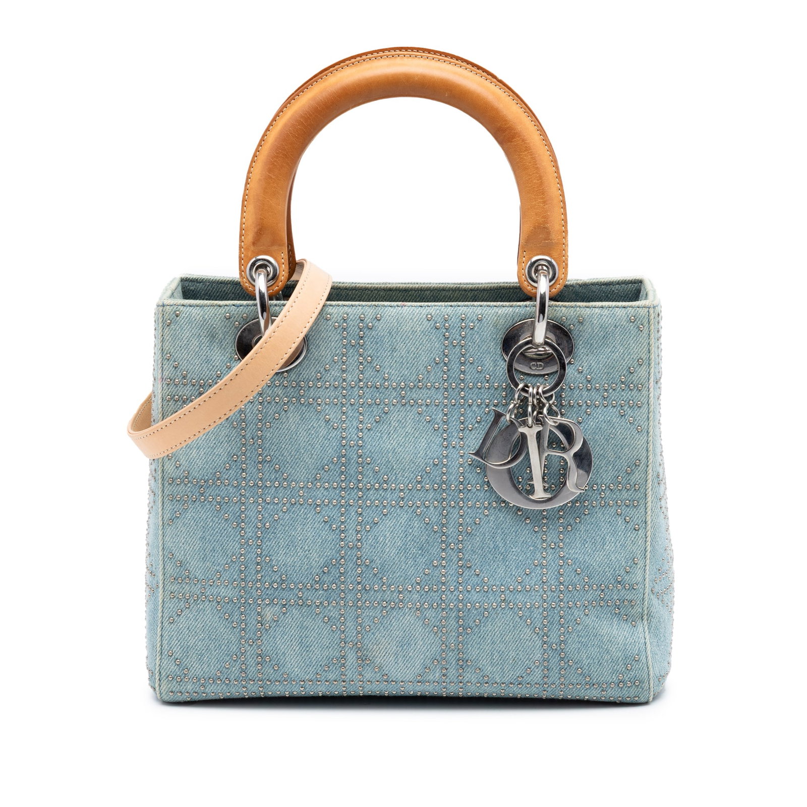 Dior Medium Denim Studded Cannage Lady Bag: Dior Medium Denim Studded Cannage Lady Bag This Medium Denim Cannage Studded Lady Dior bag features a studded denim exterior complemented by flat leather top handles and a detachable flat leather shou