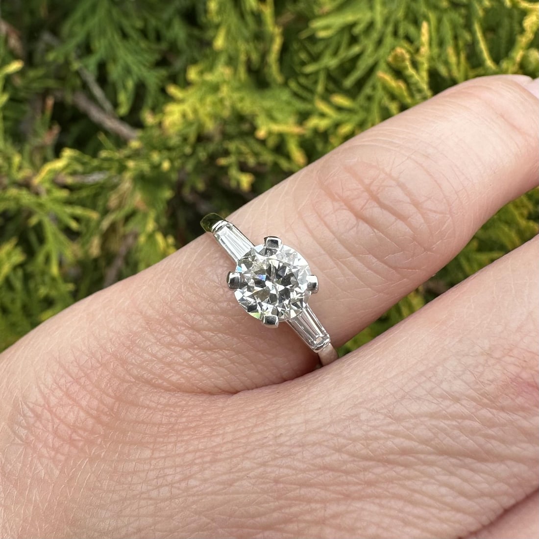 Platinum antique diamond engagement ring with baguette accents size 6: Platinum antique diamond engagement ring with baguette accents size 6 This antique engagement ring features a 1.31 carat total weight of natural diamonds set in solid platinum and palladium. The cente