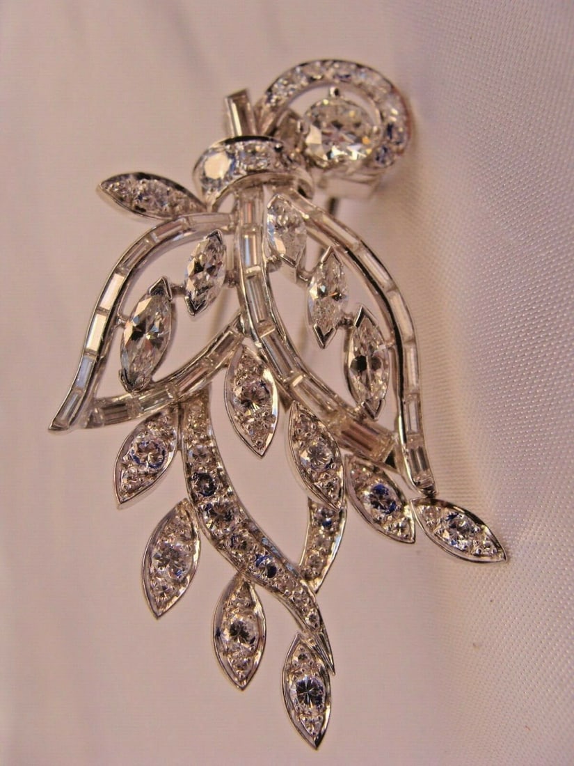 1945 French Platinum Diamond Clip-Brooch 1.50ct European Cut: 1945 French Platinum Diamond Clip-Brooch 1.50ct European Cut This exquisite 1945 French platinum diamond clip-brooch showcases exceptional detail, design, and craftsmanship. It features a stunning Eur