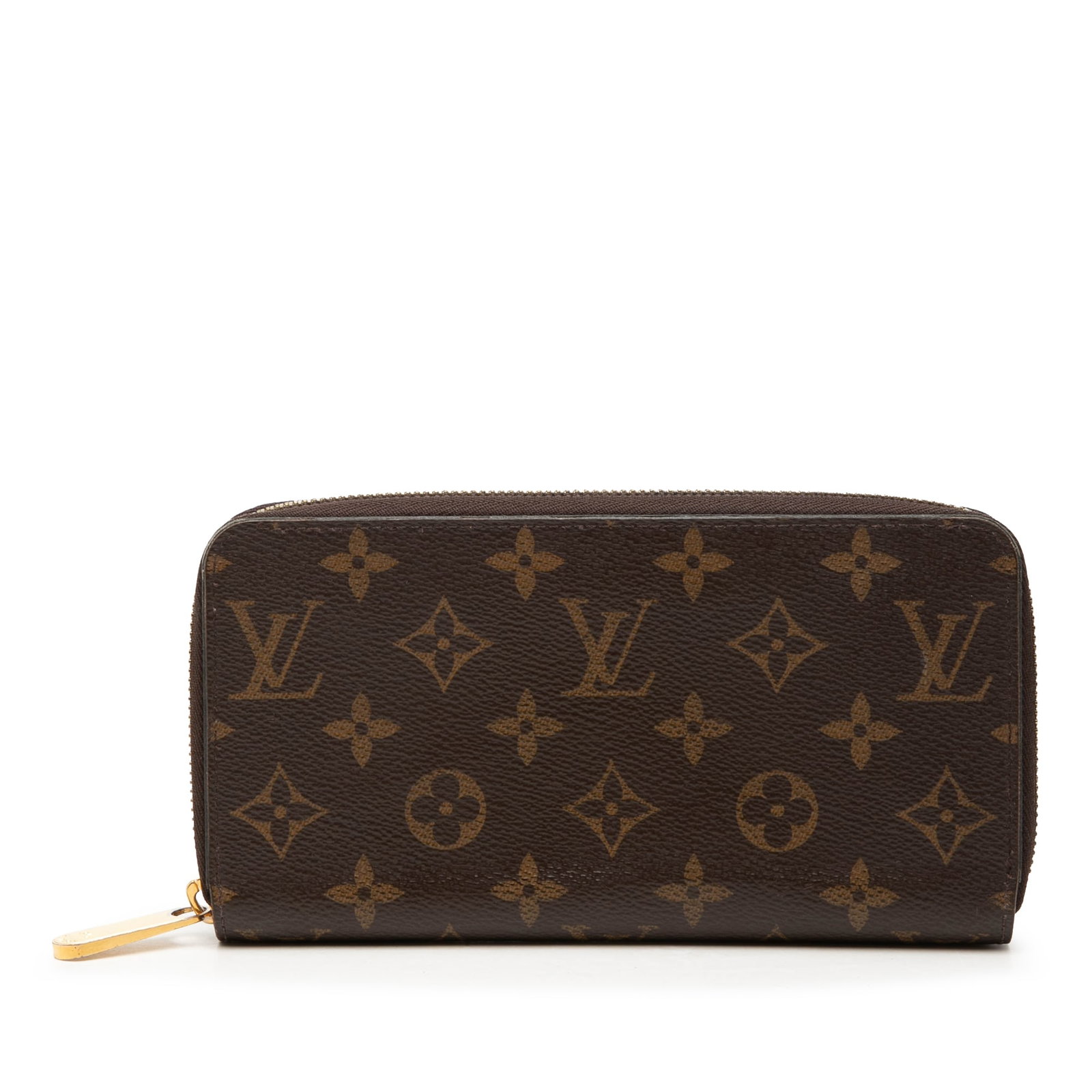 Louis Vuitton Zippy Long Wallet in Monogram Canvas: Louis Vuitton Zippy Long Wallet in Monogram Canvas Louis Vuitton Monogram Zippy Long Wallet in brown monogram canvas with a zip-around closure. It includes interior zip and slip compartments and inter