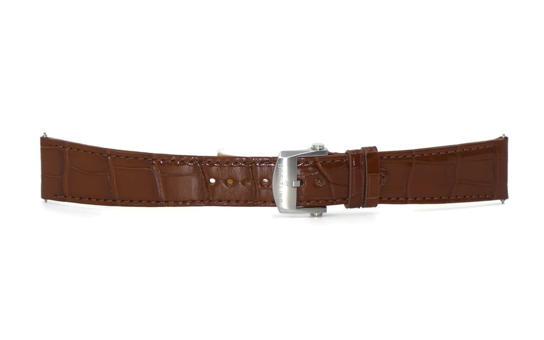 Breitling 22mm Brown Leather Wristwatch Strap Authentic: Breitling 22mm Brown Leather Wristwatch Strap Authentic Elevate your wristwatch with this authentic Breitling Brown Leather Strap. Crafted from high-quality leather, this strap features a band width o