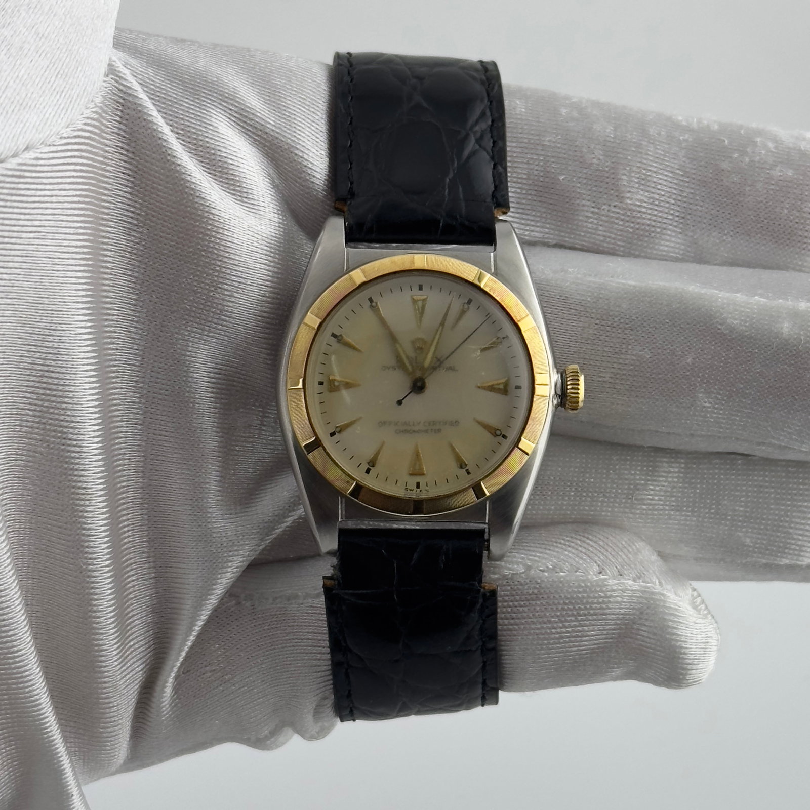 Ladies Rolex Oyster Perpetual 5011 Silver Dial Aftermarket Leather Strap Watch: Ladies Rolex Oyster Perpetual 5011 Silver Dial Aftermarket Leather Strap Watch This Rolex Oyster Perpetual watch features a silver dial and an engine-turned bezel. It is equipped with an after-market 