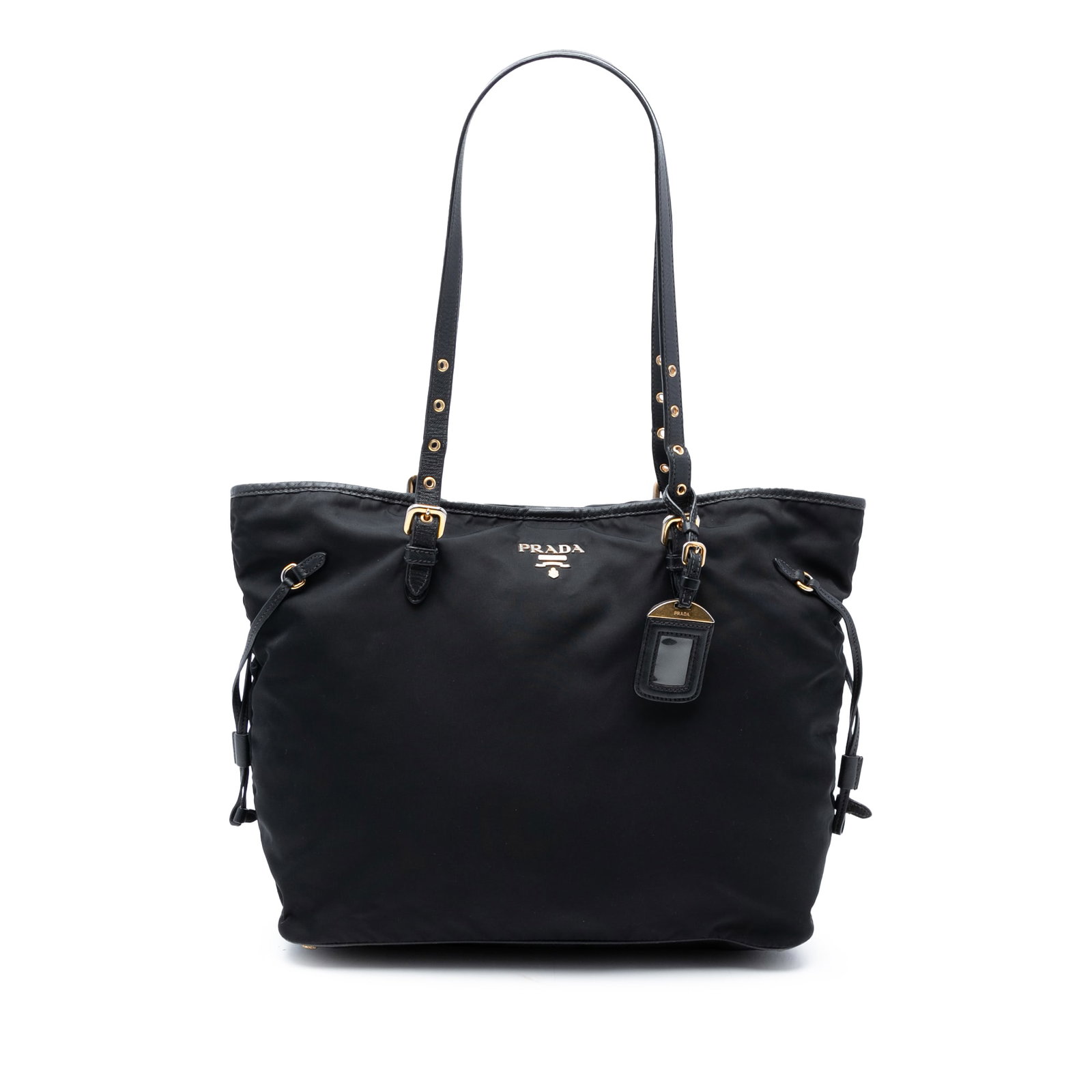 Prada black nylon tote with saffiano leather trim: Prada black nylon tote with saffiano leather trim This Prada Saffiano Trimmed Tessuto Tote features a durable nylon body accented with Saffiano leather trim. The bag is designed with adjustable flat l
