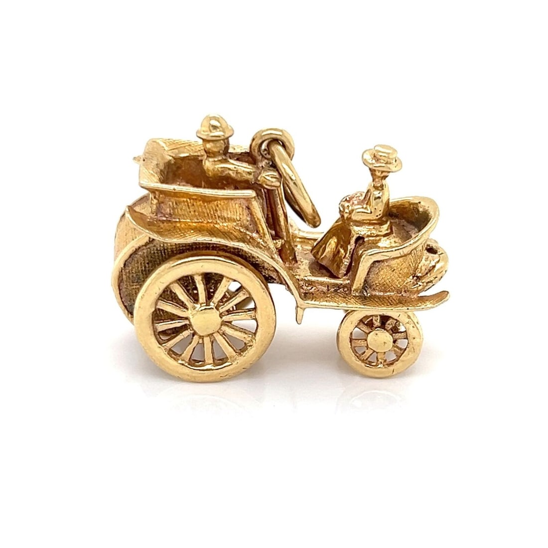 Vintage 14K Yellow Gold Moving Carriage Charm Pendant: Vintage 14K Yellow Gold Moving Carriage Charm Pendant This vintage estate charm pendant features a three-dimensional open-top carriage design with articulated moving elements. It is crafted in 14k yel