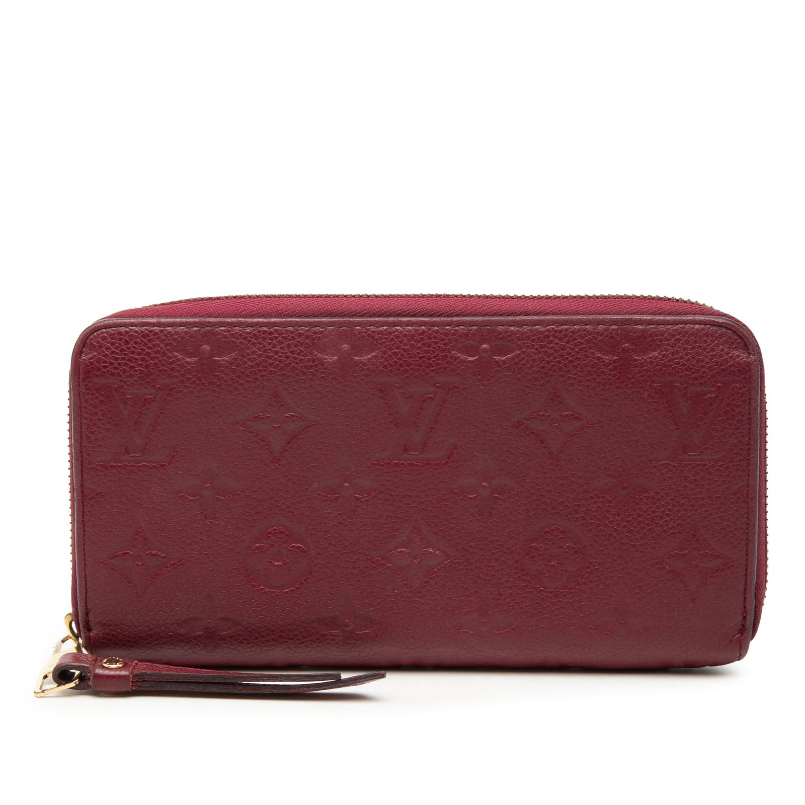 Louis Vuitton red leather zip around long wallet Monogram Empreinte: Louis Vuitton red leather zip around long wallet Monogram Empreinte This Louis Vuitton Monogram Empreinte Zippy Long Wallet is crafted from red leather and features the signature monogram empreinte pa