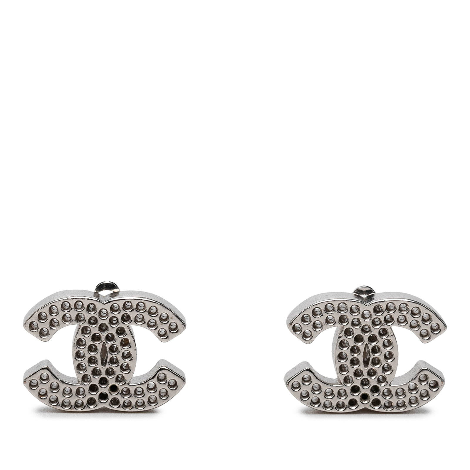 Chanel CC Clip On Earrings Silver Tone Perforated Metal: Chanel CC Clip On Earrings Silver Tone Perforated Metal Chanel CC brass perforated clip-on earrings in silver tone metal. Made in France, these costume earrings have a perforated design and clip-on ba