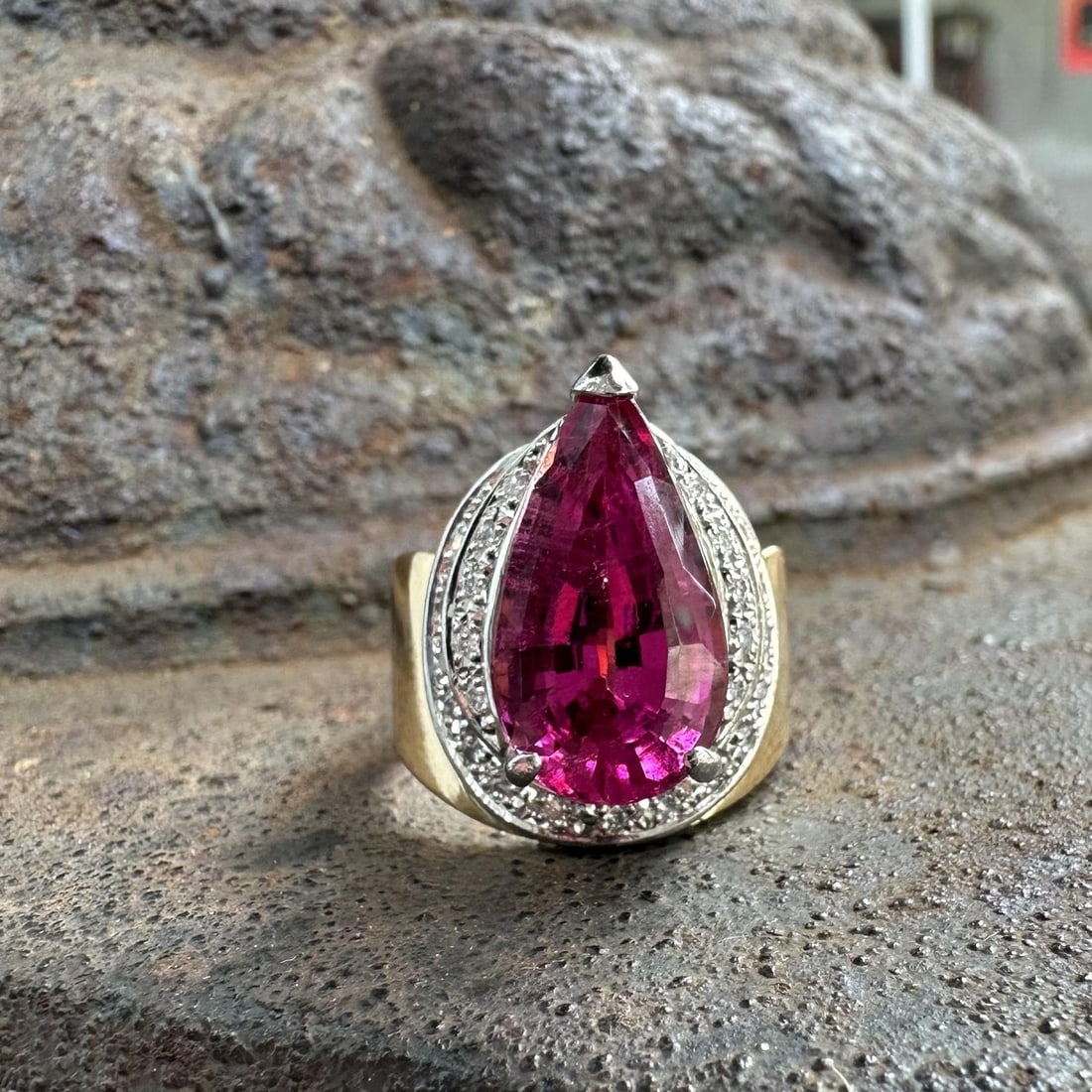 GIA Pear Rubellite Tourmaline Diamond Cocktail Ring 18k Gold Platinum: GIA Pear Rubellite Tourmaline Diamond Cocktail Ring 18k Gold Platinum This elegant cocktail ring features a large, natural rubellite tourmaline in a pear cut, prong-set and showcasing a rich purple-re