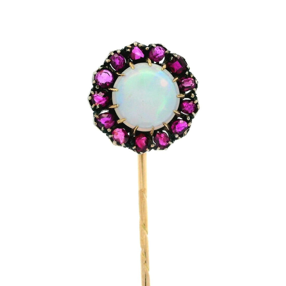 Antique 14k Yellow Gold Opal Cabochon and Ruby Halo Stick Pin: Antique 14k Yellow Gold Opal Cabochon and Ruby Halo Stick Pin Explore the elegance of this Antique Georgian stick pin, expertly crafted in 14k yellow gold. Featuring a stunning natural opal cabochon a