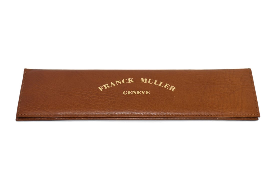 Franck Muller Brown Leather Manual Guarantee Holder: Franck Muller Brown Leather Manual Guarantee Holder This is a pre-owned Franck Muller brown leather guarantee holder, crafted in Switzerland. It is designed to securely store and protect guarantee doc