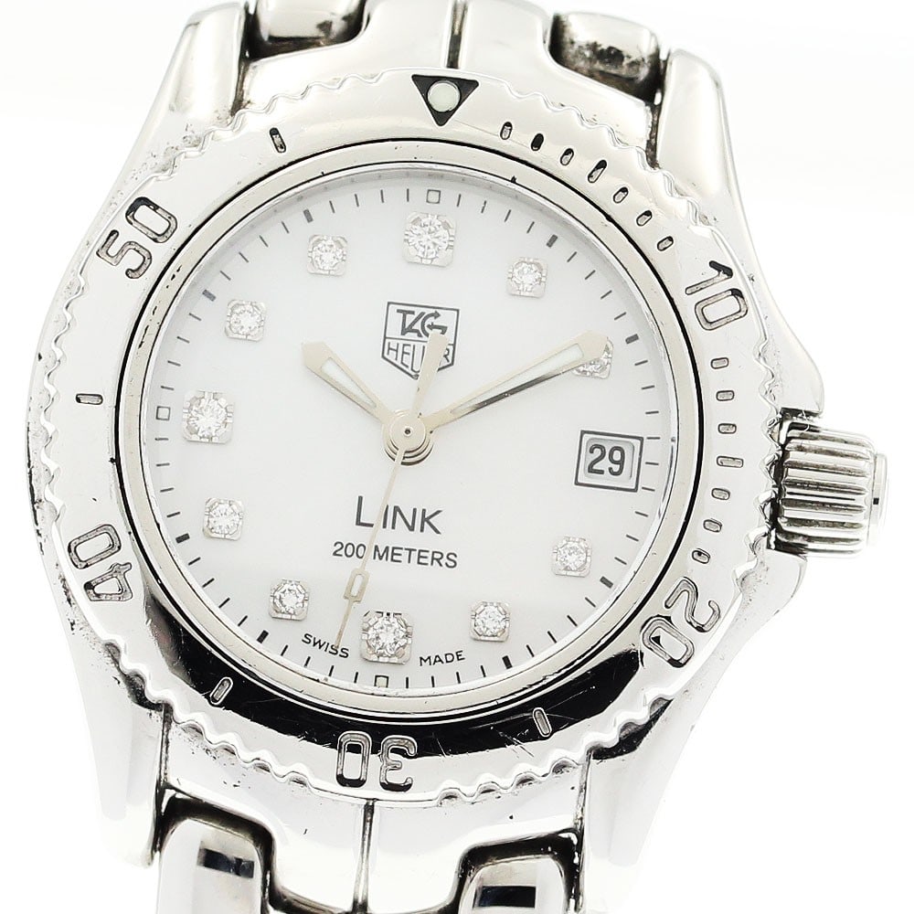 TAG Heuer Link Quartz Date Womens Stainless Steel Watch WT1418: TAG Heuer Link Quartz Date Womens Stainless Steel Watch WT1418 This TAG Heuer Link Date Quartz women's wristwatch features a stainless steel case and bracelet, complemented by a white mother-of-pearl 