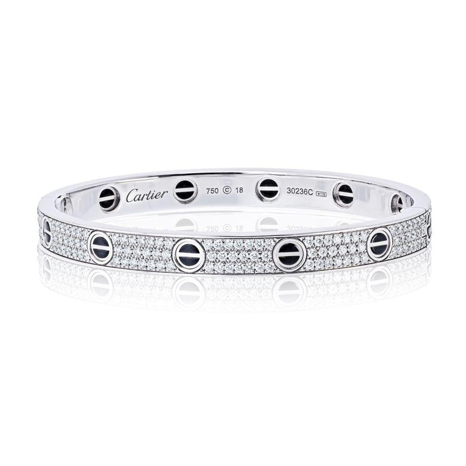 Cartier Love Collection Bracelet in 18K White Gold Diamond Pave Black Ceramic Size 18 with: Cartier Love Collection Bracelet in 18K White Gold Diamond Pave Black Ceramic Size 18 with Certificate This Cartier Love bracelet is crafted from 18K white gold and black ceramic, featuring a pave dia