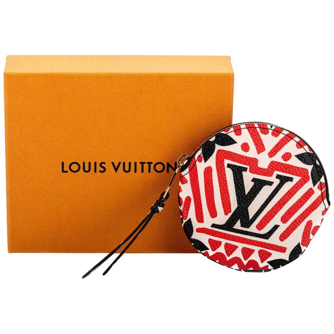 Limited Edition Louis Vuitton Tribal Round Coin Case: Limited Edition Louis Vuitton Tribal Round Coin Case This Louis Vuitton Tribal Round Coin Case is a limited edition piece, elegantly designed with monogram coated canvas complemented by black leather 
