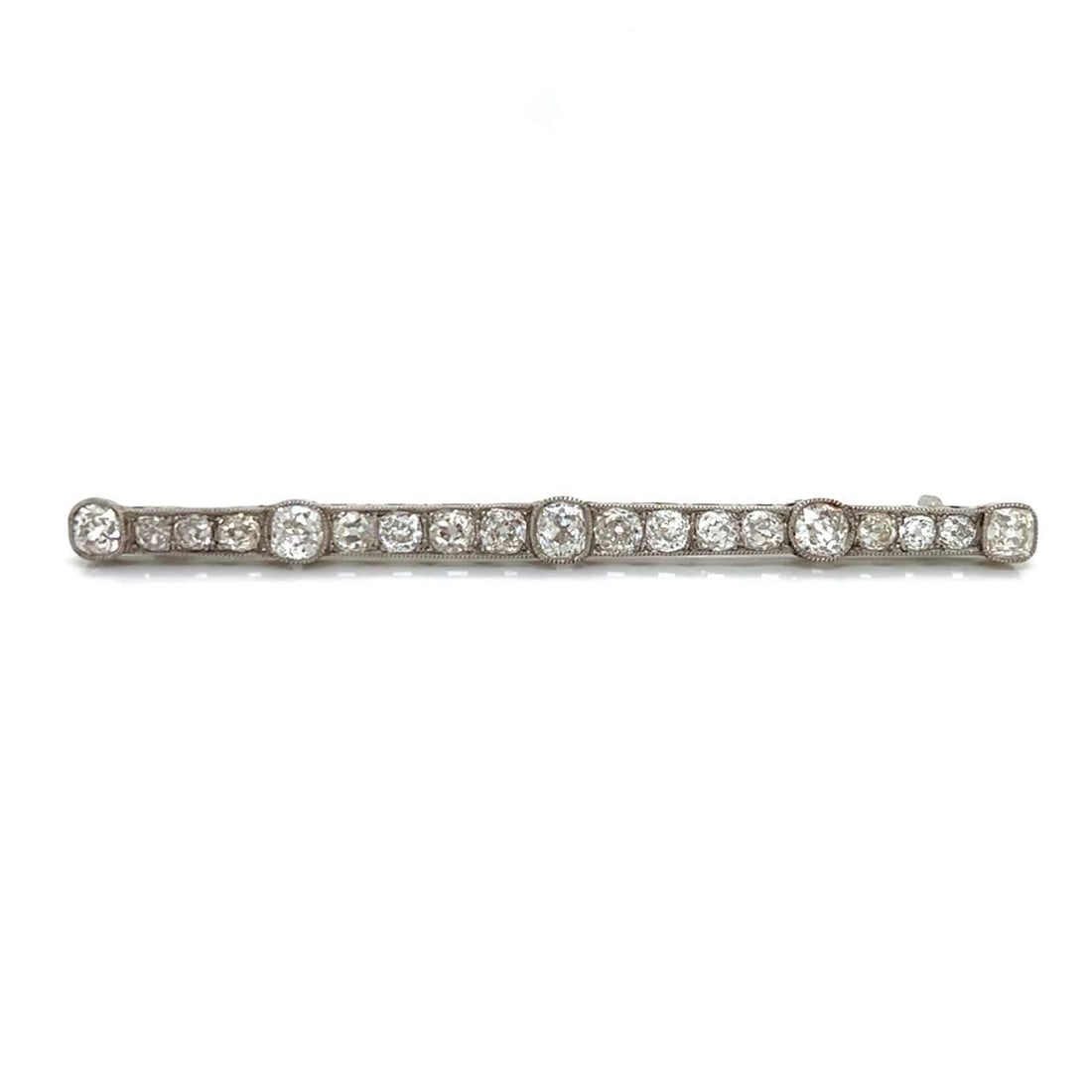 Art Deco Platinum Pin 7.50 Ct Old Mine Diamonds G-J VS1-SI1: Art Deco Platinum Pin 7.50 Ct Old Mine Diamonds G-J VS1-SI1 This exquisite Art Deco pin is crafted from platinum and features a stunning total of 7.50 carats of Old Mine Diamonds. The centerpiece incl