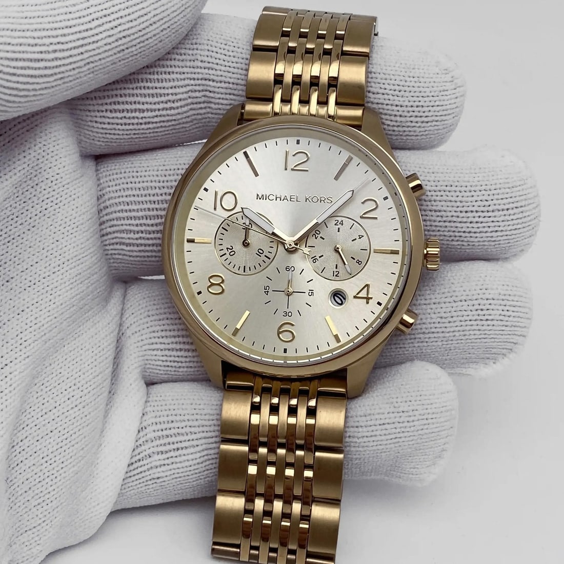 Michael Kors Merrick Quartz Chronograph 42mm Gold Dial Men's Watch MK8638: Michael Kors Merrick Quartz Chronograph 42mm Gold Dial Men's Watch MK8638 The Michael Kors Merrick Chronograph is a stylish wristwatch perfect for casual wear. This timepiece features a striking 42mm 