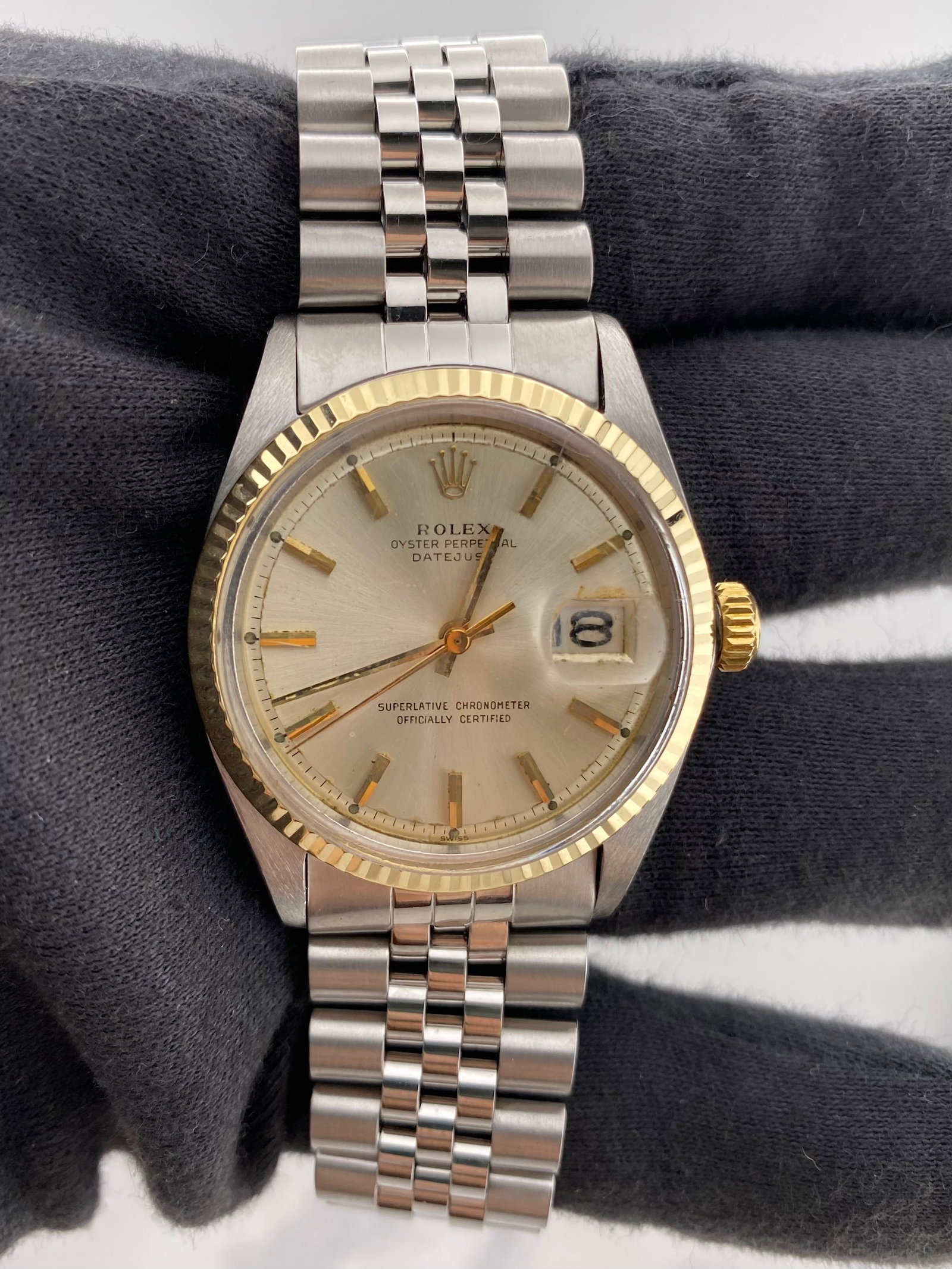 Rolex Datejust 1601 Silver Stick Dial Jubilee Steel Bracelet: Rolex Datejust 1601 Silver Stick Dial Jubilee Steel Bracelet This Rolex Datejust features a silver stick dial with visible spots, complemented by a fluted bezel and a D-Link Jubilee steel bracelet. Th