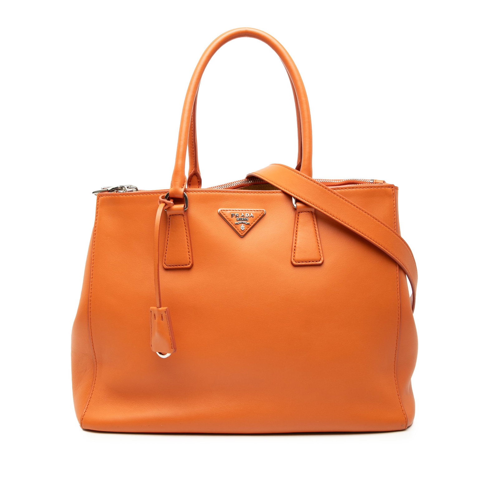 Prada Galleria Medium Soft Calf Leather Double Zip Orange Tote Bag: Prada Galleria Medium Soft Calf Leather Double Zip Orange Tote Bag This Prada Medium Soft Calf Galleria Double Zip Tote features an orange leather body with rolled leather handles, a detachable flat s