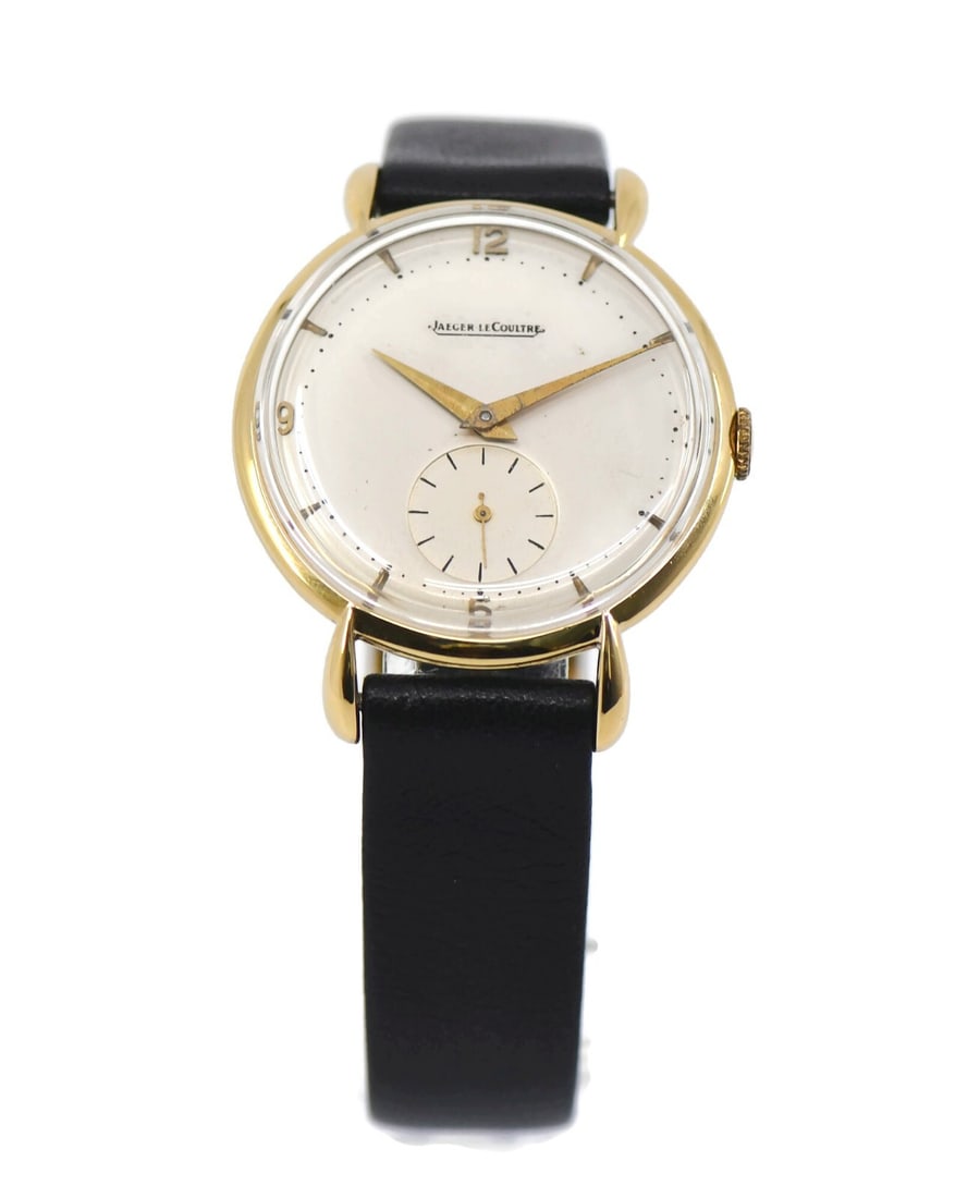 Jaeger-LeCoultre Vintage 18K Yellow Gold Mechanical Watch: Jaeger-LeCoultre Vintage 18K Yellow Gold Mechanical Watch This exquisite vintage wristwatch from Jaeger-LeCoultre showcases a classic design, meticulously crafted with an 18K yellow gold case that mea
