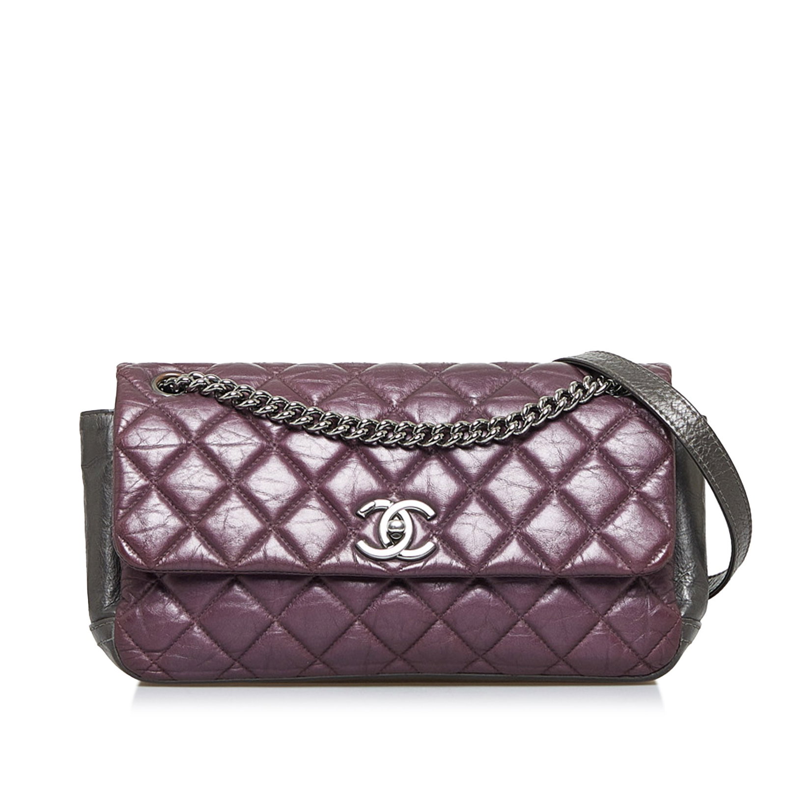 Chanel Purple Glazed Matelasse Portobello Flap Bag with CC Turn Lock: Chanel Purple Glazed Matelasse Portobello Flap Bag with CC Turn Lock The Chanel Glazed Matelasse Portobello Flap Bag boasts a striking quilted leather body in a rich purple hue, complemented by stylis