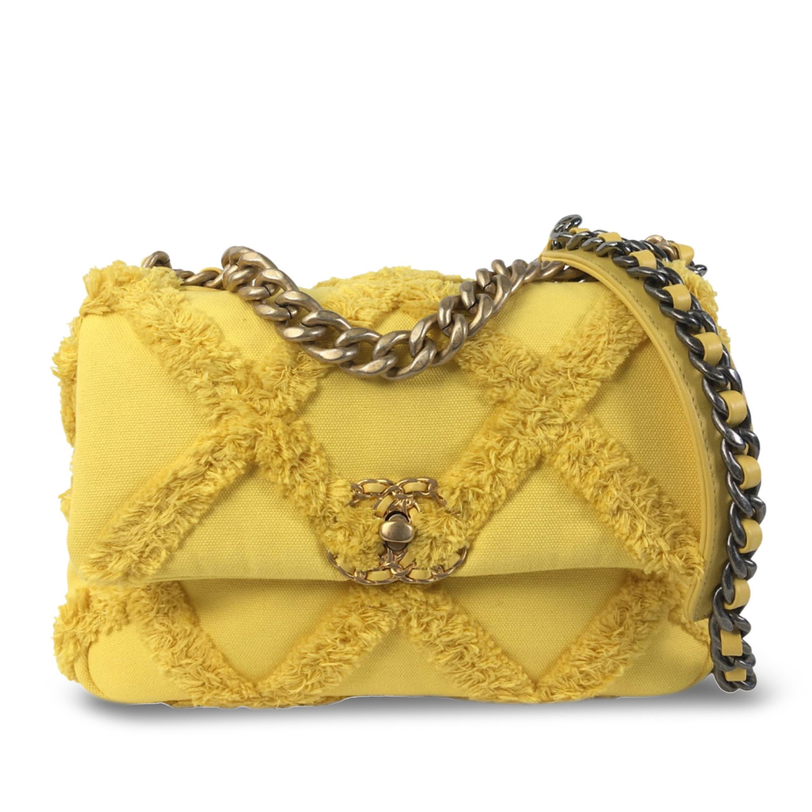 Chanel Medium Canvas 19 Flap Yellow Bag with Chain Strap: Chanel Medium Canvas 19 Flap Yellow Bag with Chain Strap Introducing the Chanel Medium Canvas 19 Flap, an exquisite addition to your collection. This stylish bag features a vibrant yellow canvas body 