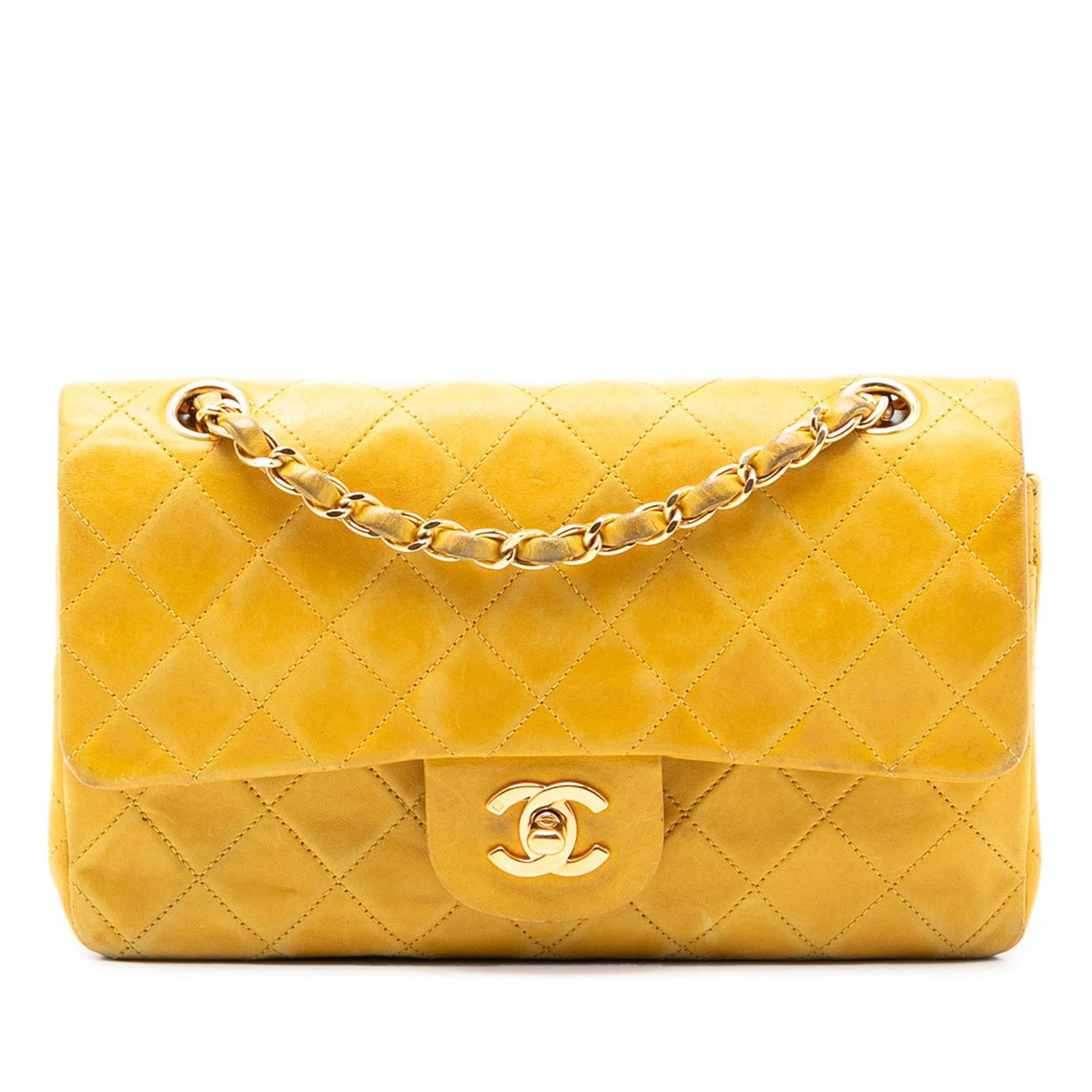 Yellow Chanel Quilted Lambskin Small Double Flap Shoulder Bag: Yellow Chanel Quilted Lambskin Small Double Flap Shoulder Bag This Chanel Small Classic Double Flap bag is crafted from quilted yellow lambskin leather and features leather-woven chain link shoulder s