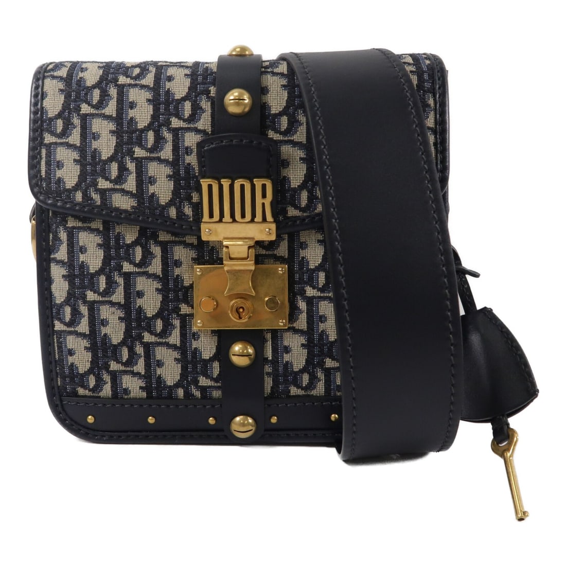 Dior Addict Oblique Canvas Flap Shoulder Bag Navy CD Hardware: Dior Addict Oblique Canvas Flap Shoulder Bag Navy CD Hardware A Christian Dior Dior Addict flap shoulder bag in navy canvas with a square silhouette. The bag features a flap pocket layout and comes wi