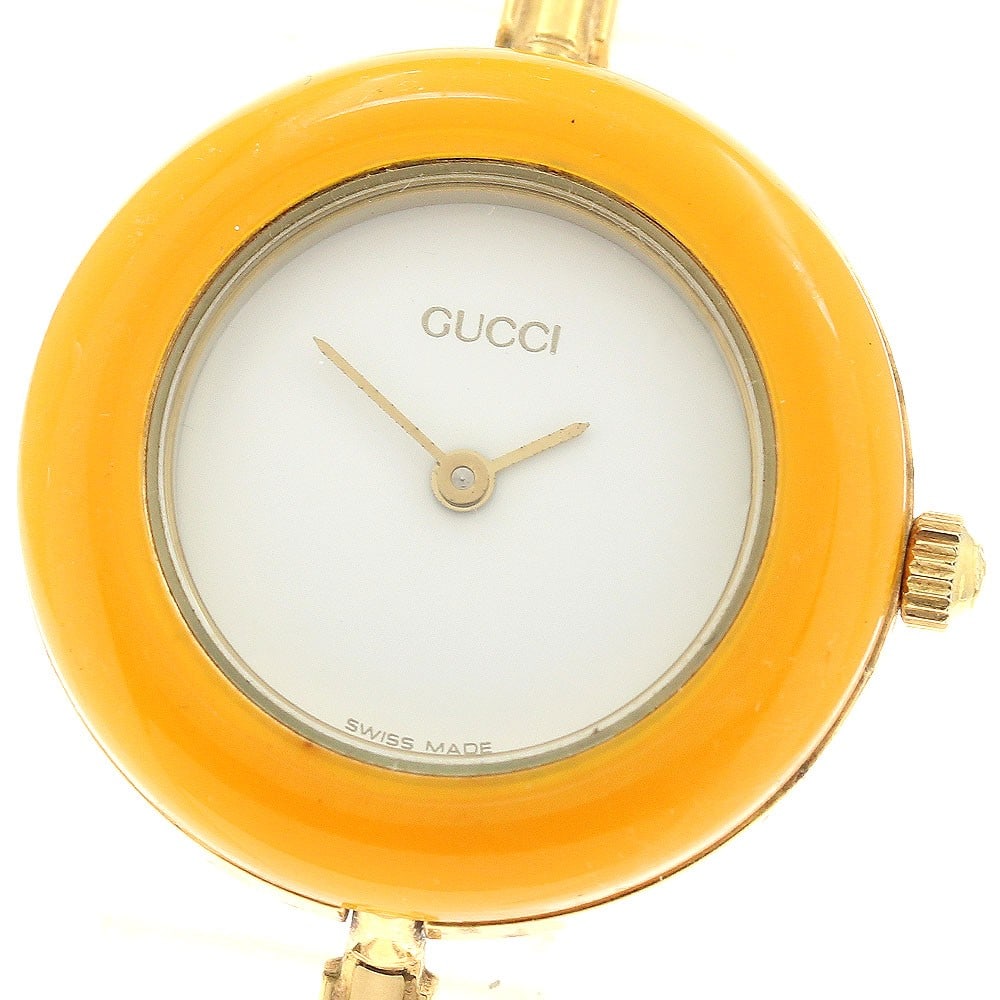 Gucci Change Bezel Quartz Womens Wristwatch with 10 Bezels: Gucci Change Bezel Quartz Womens Wristwatch with 10 Bezels This pre-owned Gucci 11/12.2 Changeable Bezel Quartz women's wristwatch features a white dial and comes with 10 interchangeable bezels, an in
