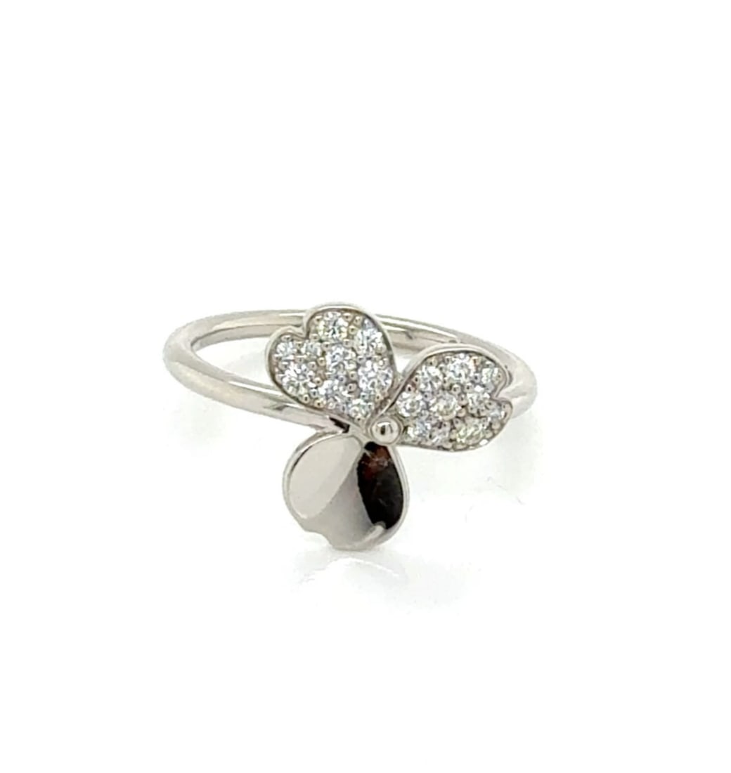 Tiffany & Co. Paper Flowers Platinum Diamond Floral Ring Size 6: Tiffany & Co. Paper Flowers Platinum Diamond Floral Ring Size 6 A Tiffany & Co. Paper Flowers floral diamond ring crafted in platinum (Pt950), featuring a sculpted floral motif with a central natural 