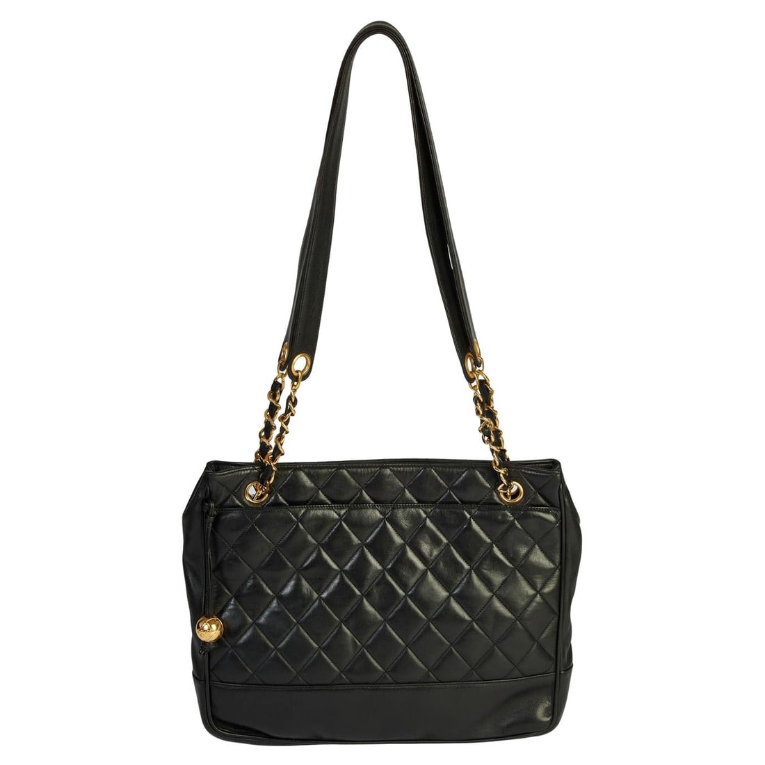 Chanel Vintage Black Quilted Tote 1991/1994 Gold Tone Hardware: Chanel Vintage Black Quilted Tote 1991/1994 Gold Tone Hardware This Chanel Vintage Black Quilted Zipper Tote is a timeless piece from the 1991/1994 collection. Crafted in Italy, it features luxurious 